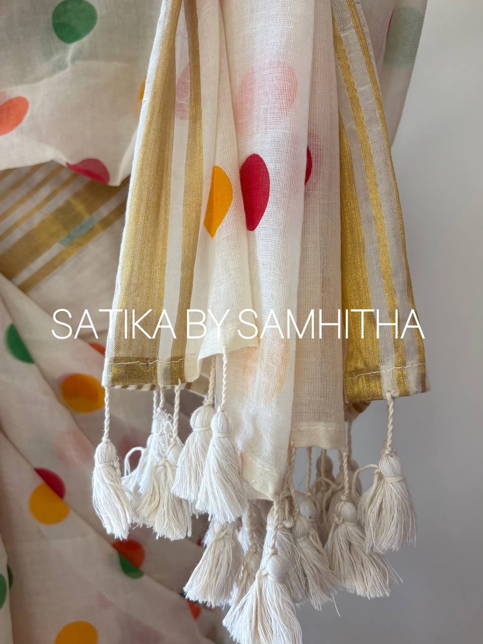 STSC11 - 120 count premium Mulcotton saree, A whimsical palette of orange, green, and red polka dots scattered across a pristine ivory backdrop, Pre booking open now, dispatch within 10 working days