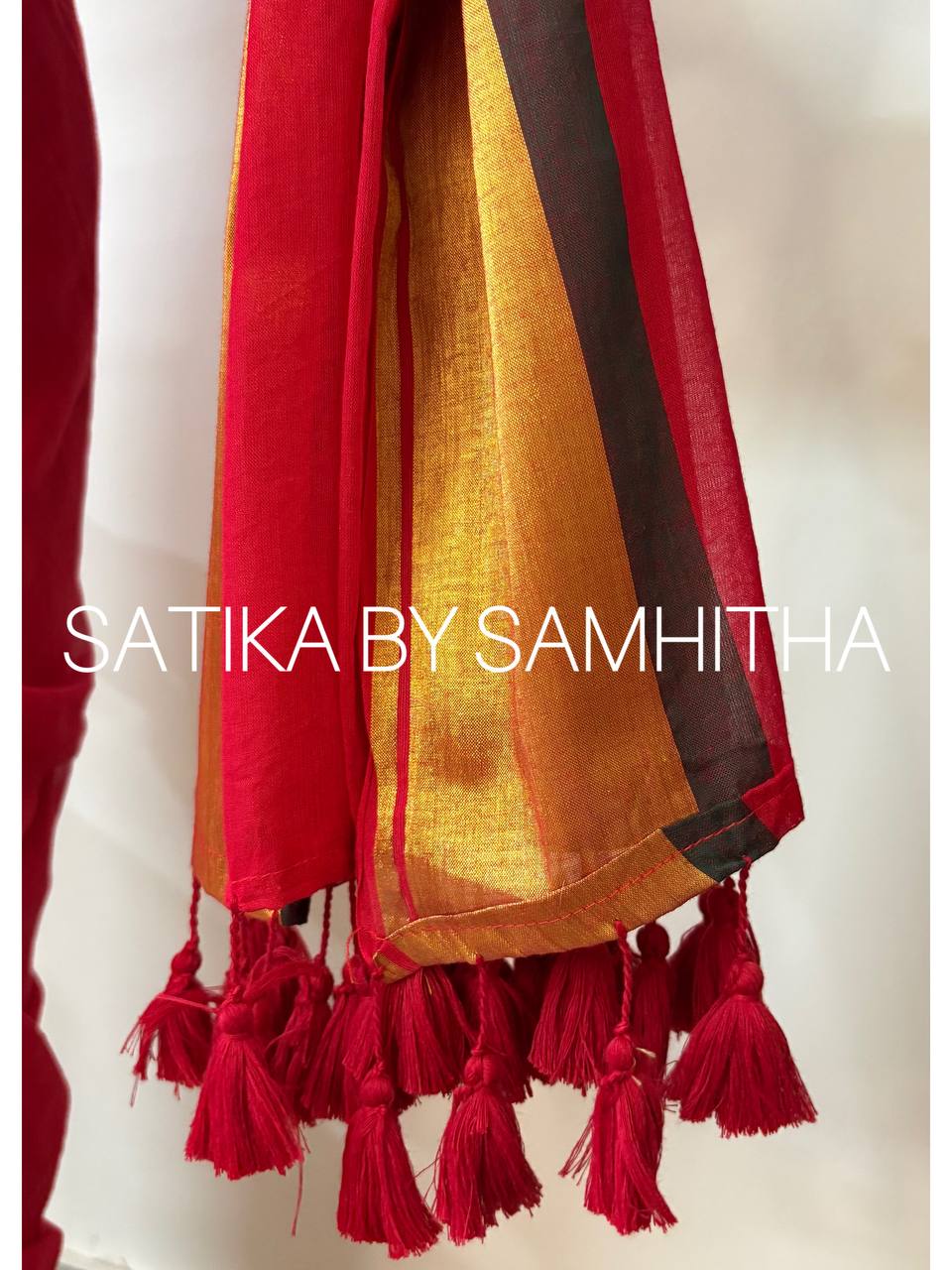 STSC21 - Pure 120 count Mulcotton Saree, Crimson Red colour with contrast Dark green and golden zari Border.
