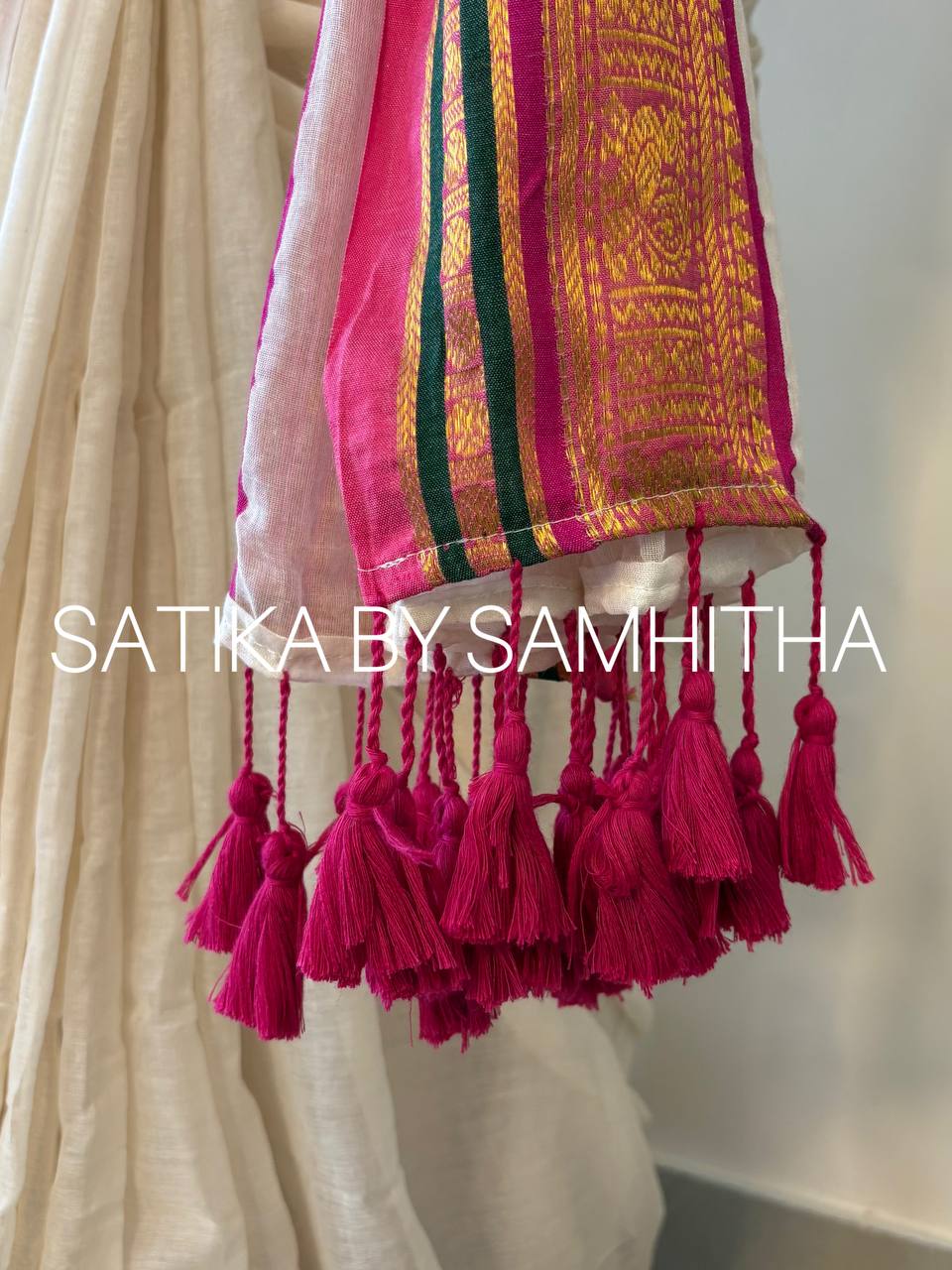 STSC36 - Pure 120 count Mulcotton Saree, off-white body with a striking fuchsia pink and deep bottle green border with kanchi motifs, Ready to dispatch