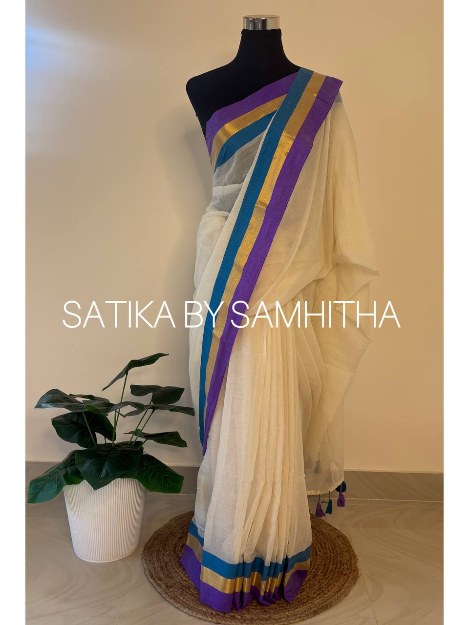 STSC09 - 120 count premium Mulcotton saree, Off-white shade with a striking multi-toned border in royal purple, teal, and gold zari, Pre booking open now, dispatch within 10 working days