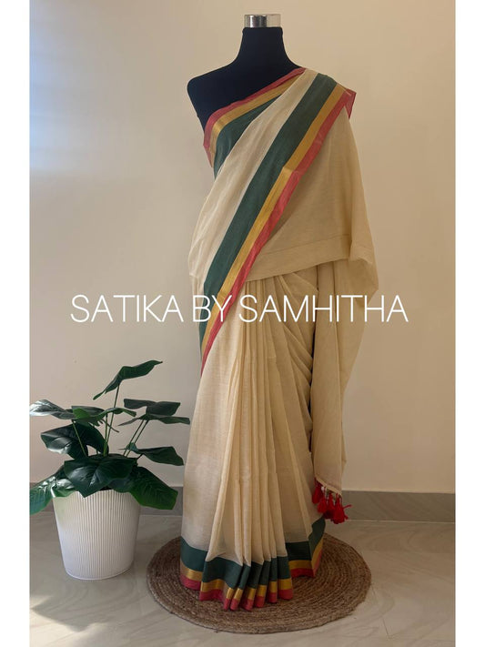 STSC10 - 120 count premium Mulcotton saree, A sophisticated cream-beige base paired with a bold, tri-color border in deep forest green, gold zari, and crimson red