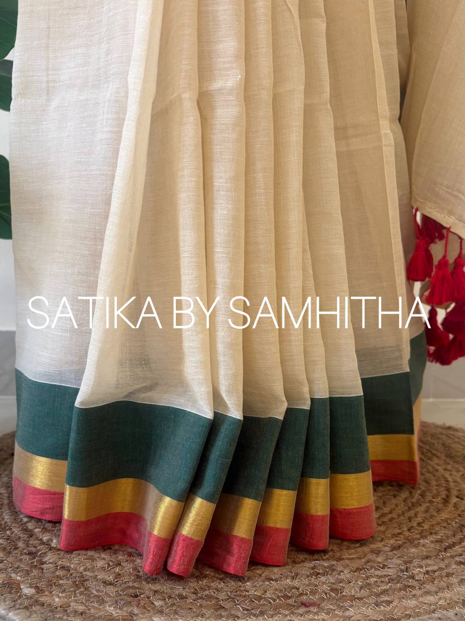 STSC10 - 120 count premium Mulcotton saree, A sophisticated cream-beige base paired with a bold, tri-color border in deep forest green, gold zari, and crimson red, Pre booking open now, dispatch within 10 working days