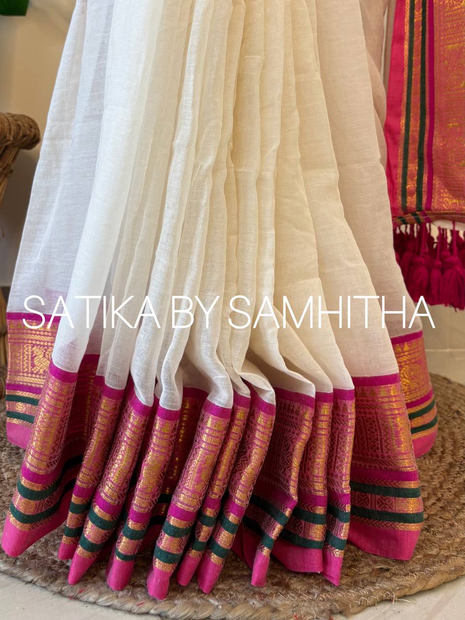 STSC36 - Pure 120 count Mulcotton Saree, off-white body with a striking fuchsia pink and deep bottle green border with kanchi motifs, Ready to dispatch