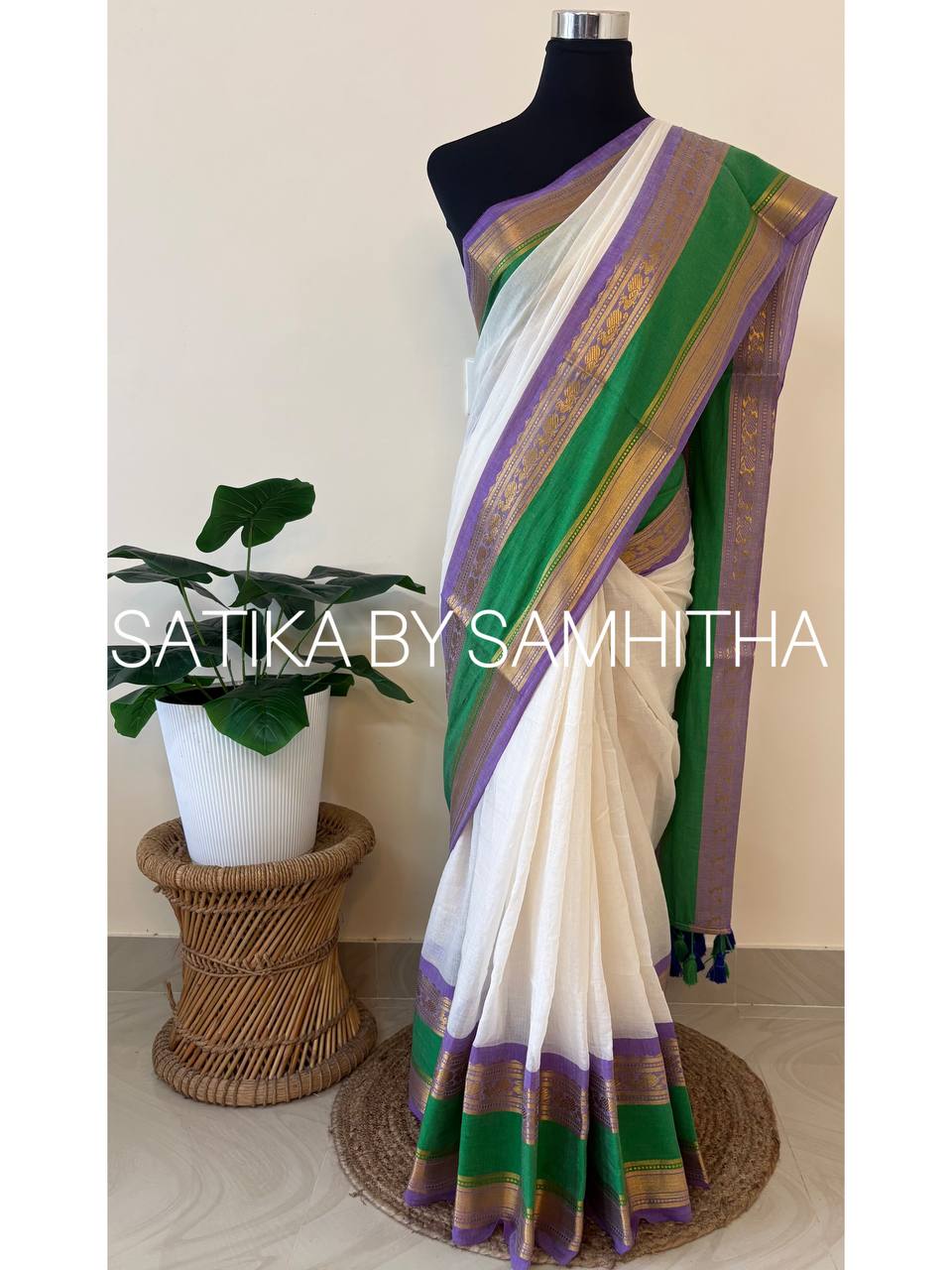 STSC37 - Pure 120 count Mulcotton Saree, off-white body with a striking contrast lavender and rich emerald green border with kanchi motifs, Ready to dispatch