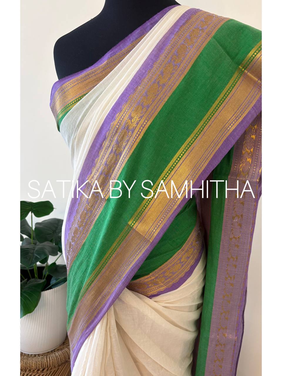 STSC37 - Pure 120 count Mulcotton Saree, off-white body with a striking contrast lavender and rich emerald green border with kanchi motifs, Ready to dispatch
