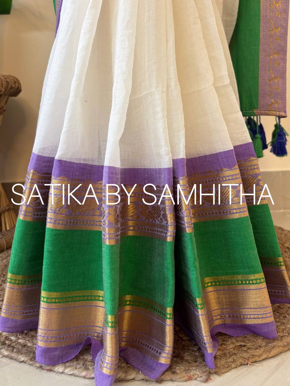 STSC37 - Pure 120 count Mulcotton Saree, off-white body with a striking contrast lavender and rich emerald green border with kanchi motifs, Ready to dispatch