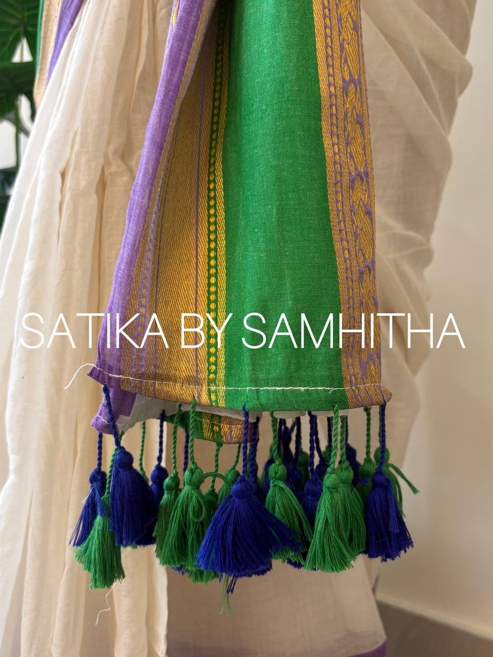 STSC37 - Pure 120 count Mulcotton Saree, off-white body with a striking contrast lavender and rich emerald green border with kanchi motifs, Ready to dispatch