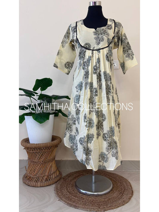 SC3280 - Premium Soft Cotton kurtis with floral prints, highlighted with crochet lace, Kerala cream colour with Green and black  print