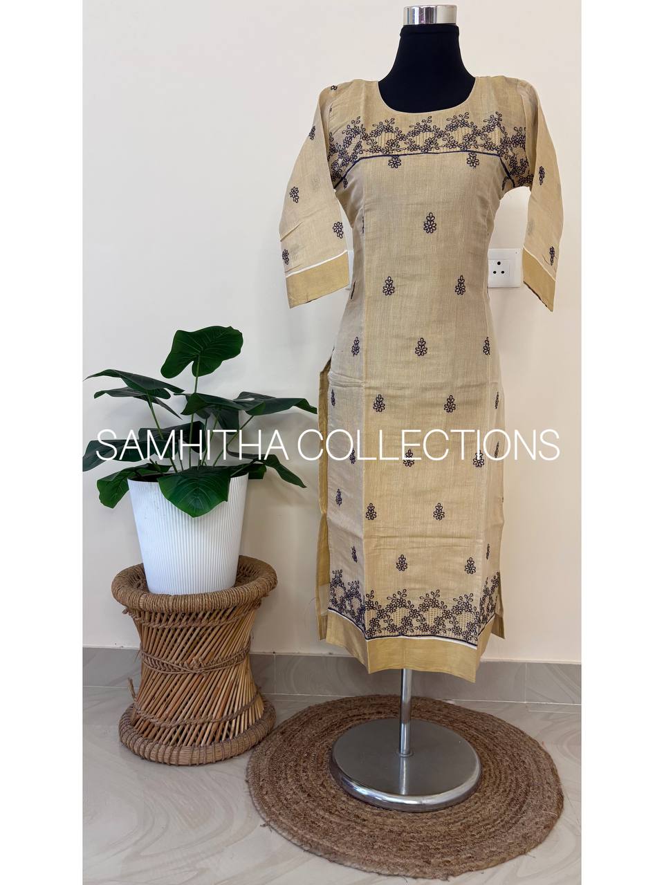 SC3290 - Kerala Tissue kurtis with allover floral embroidery highlighted with kasavu borders on daman line and sleeve ends