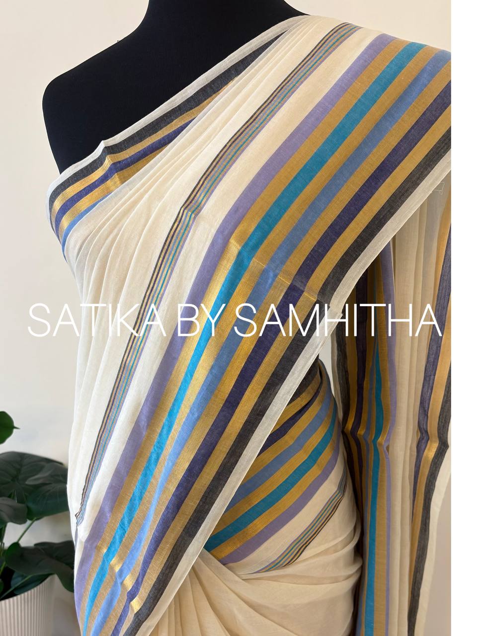 STSC38 - Pure 120 count Mulcotton Saree, off-white body with a striking golden zari striped and premium multi colour woven border, Ready to dispatch