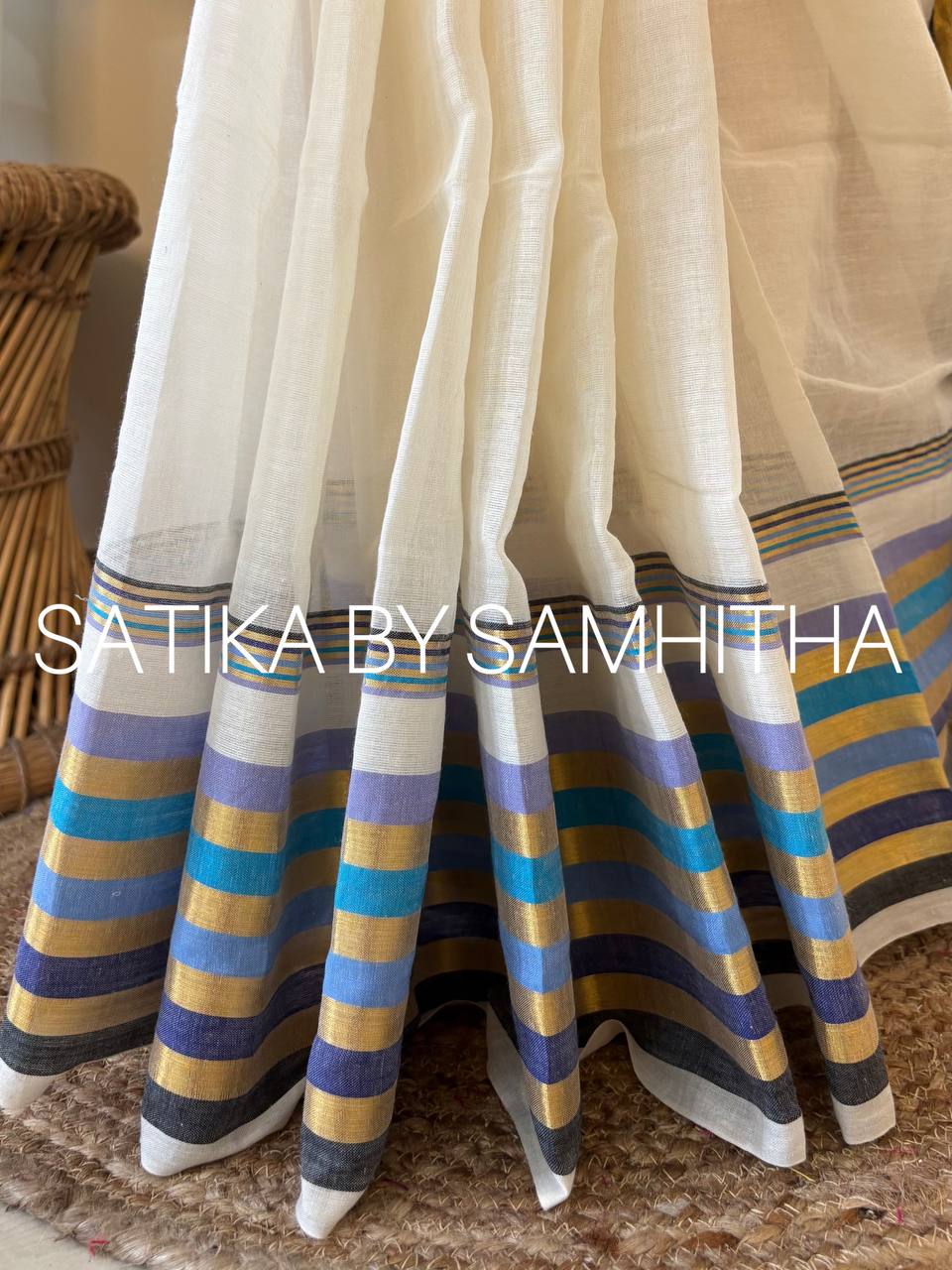 STSC38 - Pure 120 count Mulcotton Saree, off-white body with a striking golden zari striped and premium multi colour woven border, Ready to dispatch